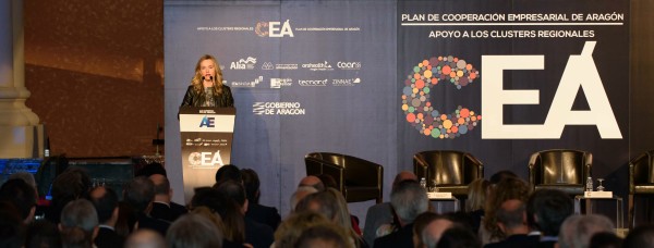 Pilar Alegría dando inicio al acto de presentación del Plan de Cooperación Empresarial de Aragón